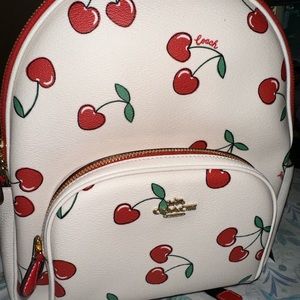 Cherry Coach backpack in good condition missing coach tag